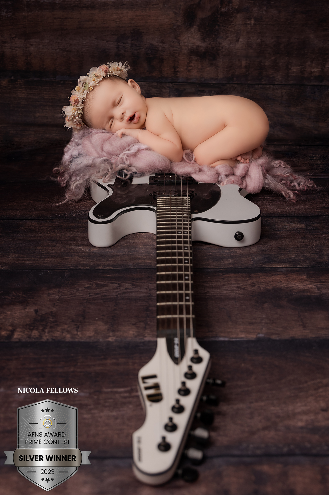 baby on a guitar<br />
newborn photographer sutton coldfield<br />
newborn photographer birmingham